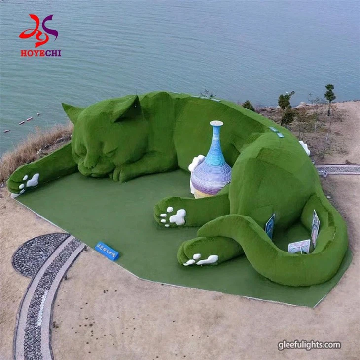 Fusion Of Nature And Art: Large Green Animal Plant Sculptures