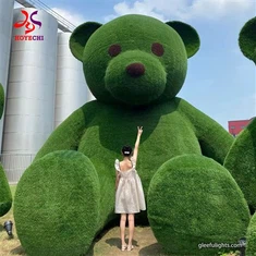 Milzu lāča dārza skulptūra: pievienojiet zaļo šarmu savai āra telpai